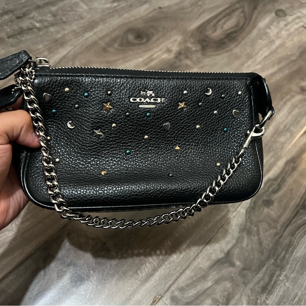 Coach star and heart studded black bag